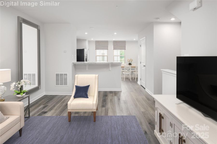 Kick back, relax, and make yourself at home! This spacious living room is all about comfort, light, and room to live your best life!