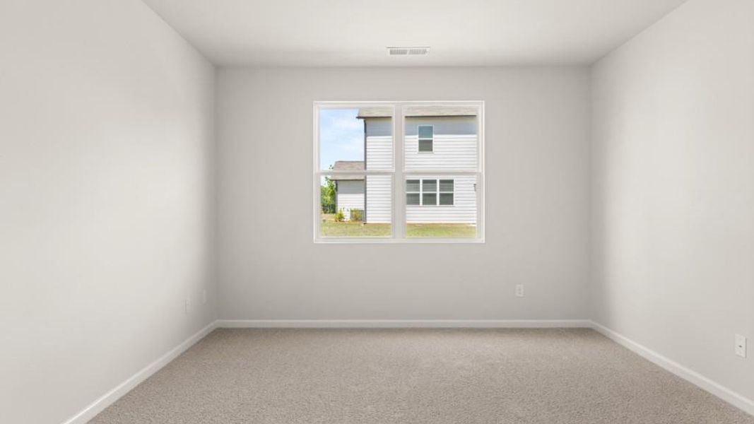 Spacious, unfurnished interior of a new home in Fairway 17 at Mirror Lake, Villa Rica (Image 18).