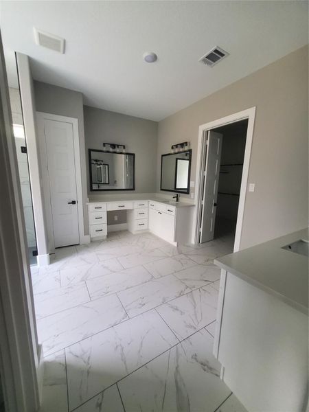 PRIMARY BATH WITH DOUBLE SINKS, CUSTOM MIRRORS, VANITY AREA, SOAKING TUB, AND A SEPARATE SHOWER PRIMARY BATH WITH DOUBLE SINKS, CUSTOM MIRRORS, VANITY AREA, SOAKING TUB, AND A SEPARATE SHOWER