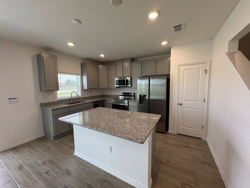 Furnished interior view inside a new home in Poinciana, Poinciana (Image 5).