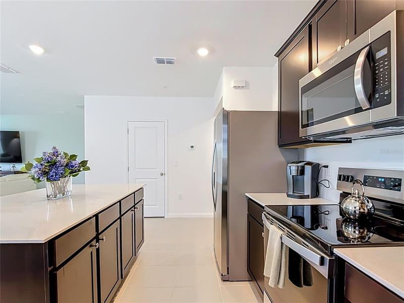Furnished interior view inside a new home in Caloosa Cove, Labelle (Image 11).