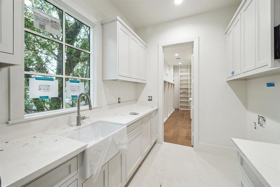 Utility Room.  Photos as of Jan. 13th, 2025.