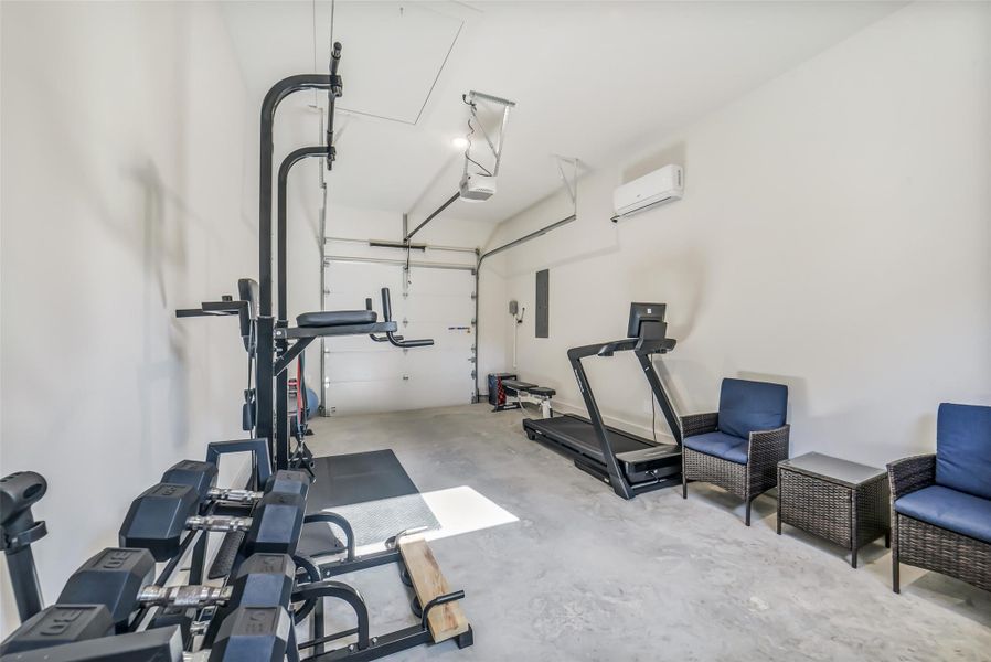 3rd Bay of Garage set up as workout area with mini split installed to heat/cool as needed 3rd Bay of Garage set up as workout area with mini split installed to heat/cool as needed