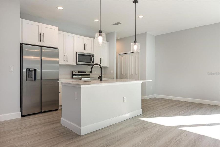Furnished interior view inside a new home in , Port Charlotte (Image 9).