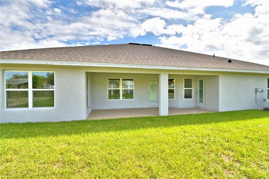 Exterior details and patio area of a home in Cadence Crossing, Auburndale (Image 3).