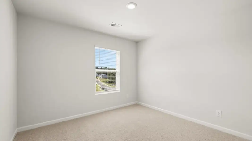 Representative unfurnished interior of a home built from the Pattison by D.R. Horton in Branford Crossing, Stockbridge (Image 18).