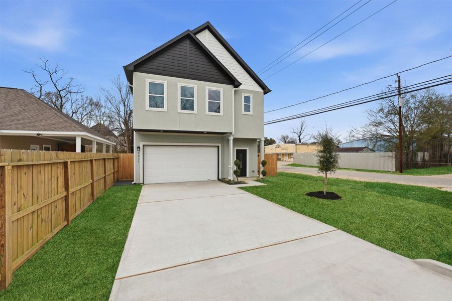 Front exterior of a new home in , Houston, TX, highlighting curb appeal (Image 20).