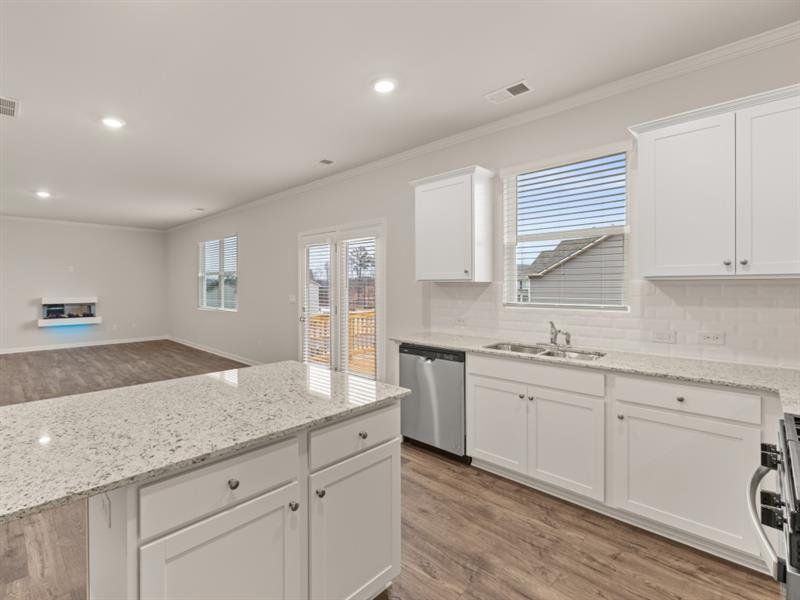 Furnished interior view inside a new home in Northwoods at Mirror Lake, Villa Rica (Image 11).