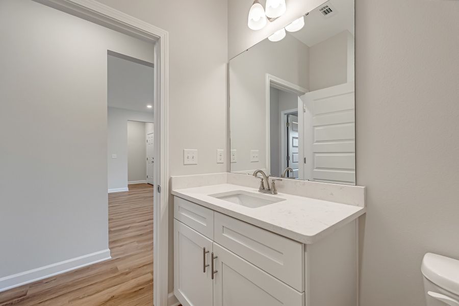 Furnished interior view inside a new home in Live Oak Cottages, Freeport (Image 14). Furnished interior view inside a new home in Live Oak Cottages, Freeport (Image 14).