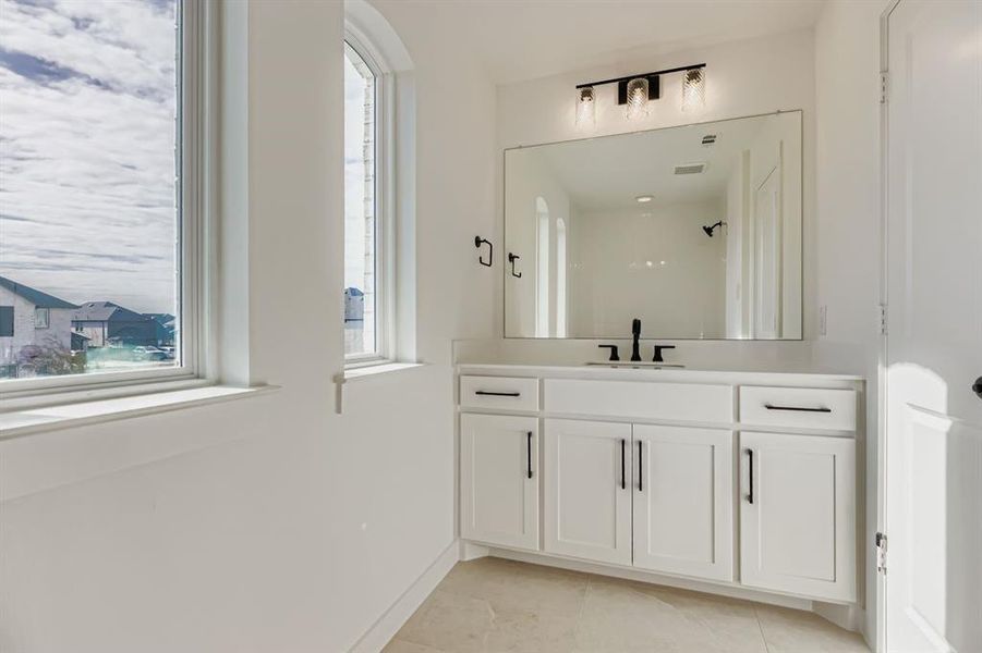 Furnished interior view inside a new home in Mosaic 40s, Prosper (Image 9).