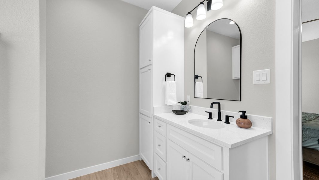 Representative furnished interior of a home built from the Loretta by Zeal Home Builders in Parallel Pastures, Poolville (Image 32).