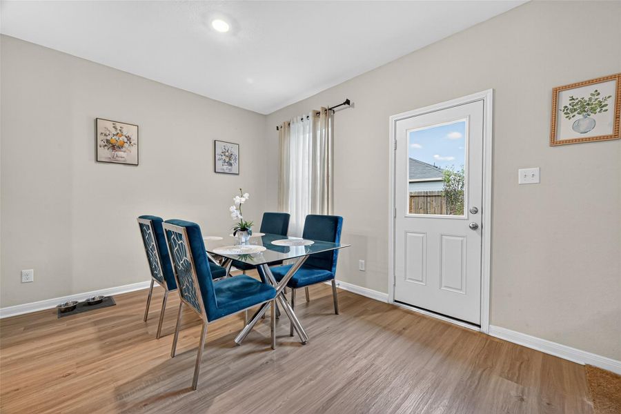 View of the dining room. Easy access to the backyard. View of the dining room. Easy access to the backyard.