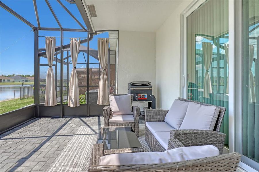 Exterior details and patio area of a home in The Timbers at Everlands, Palm Bay (Image 23).