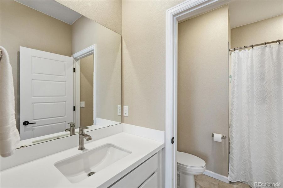 Jack and Jill bathroom connected to bedroom #4.