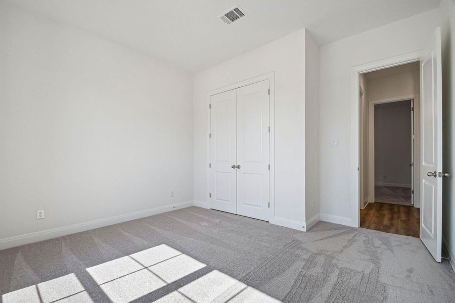 Spacious, unfurnished interior of a new home in 6 Creeks, Kyle (Image 32).