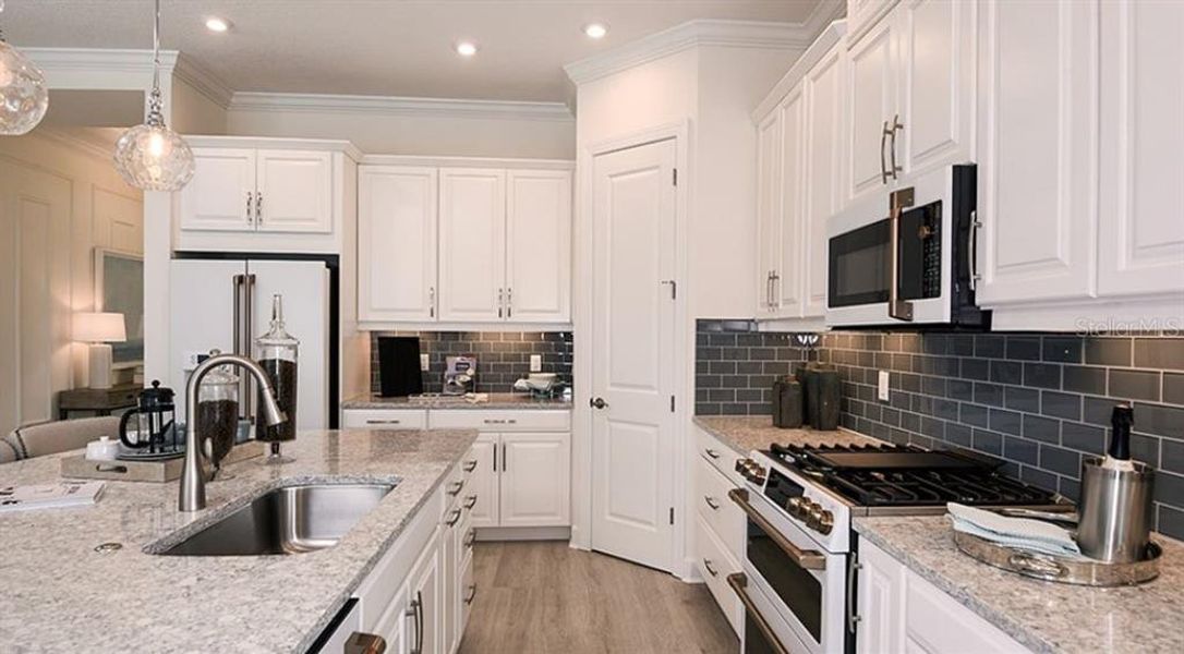 Furnished interior view inside a new home in Esplanade at Azario Lakewood Ranch, Lakewood Ranch (Image 9).