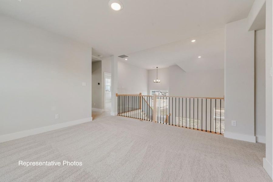 Representative unfurnished interior of a home built from the Royal Catherine IV by Grand Homes in Edgewater, Fate (Image 20).