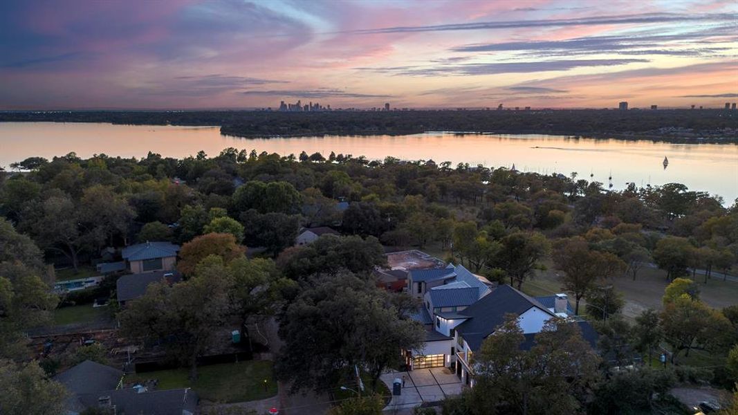 Aerial view of property and surrounding area with a nearby body of water Aerial view of property and surrounding area with a nearby body of water