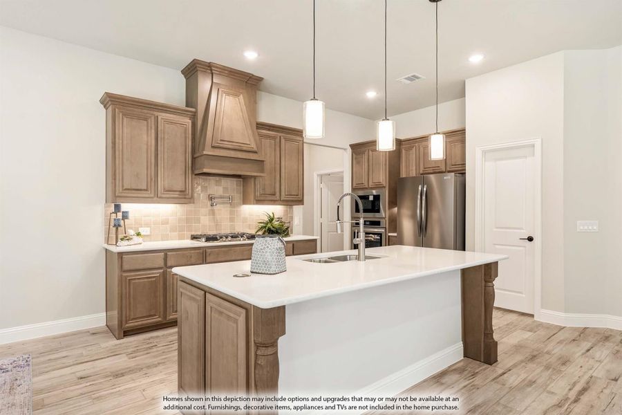 Kitchen with brown wood cabinets, center island with white countertop, pendant lights, and stainless steel appliances Kitchen with brown wood cabinets, center island with white countertop, pendant lights, and stainless steel appliances