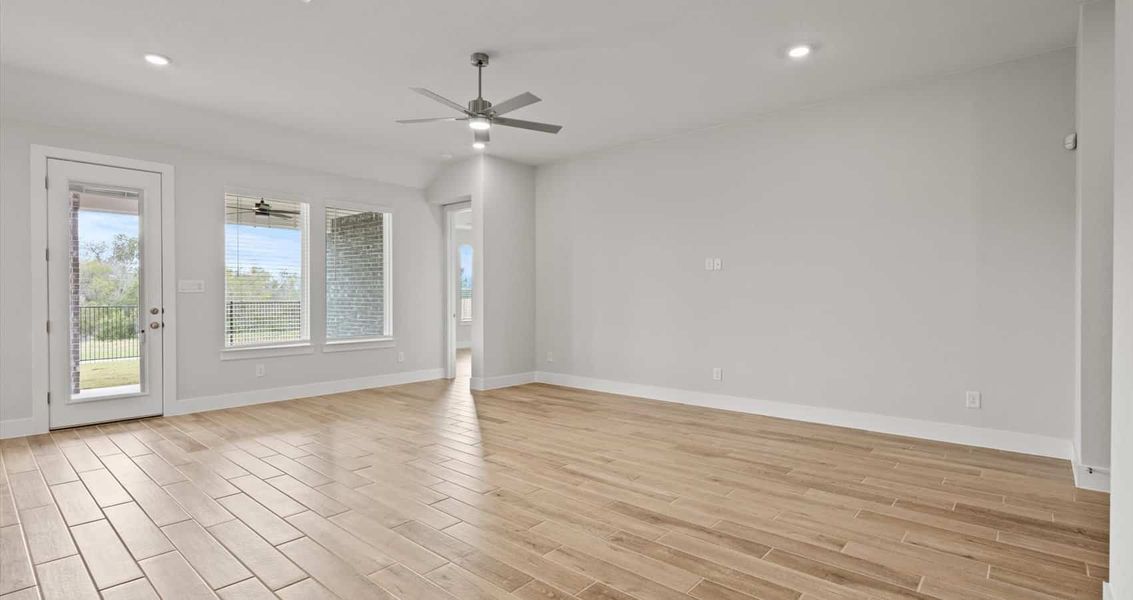 Representative unfurnished interior of a home built from the Aspen by Chesmar Homes in Village at Three Oaks, Seguin (Image 8).