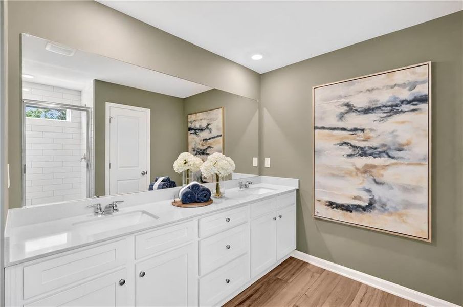 Furnished interior view inside a new home in Towns at Holly Springs, Holly Springs (Image 12). Furnished interior view inside a new home in Towns at Holly Springs, Holly Springs (Image 12).