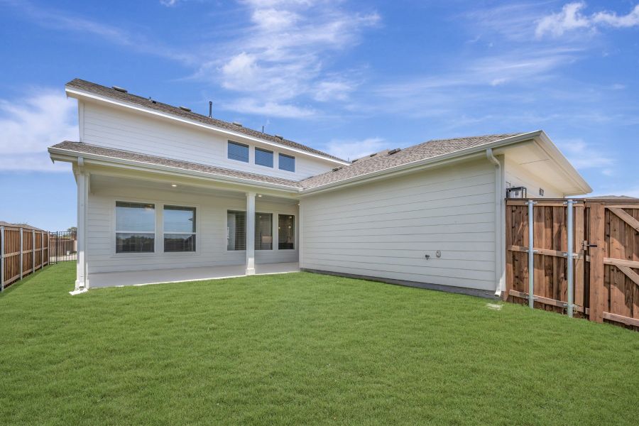 Exterior details and patio area of a home in Karis - Village Series, Crowley (Image 3).