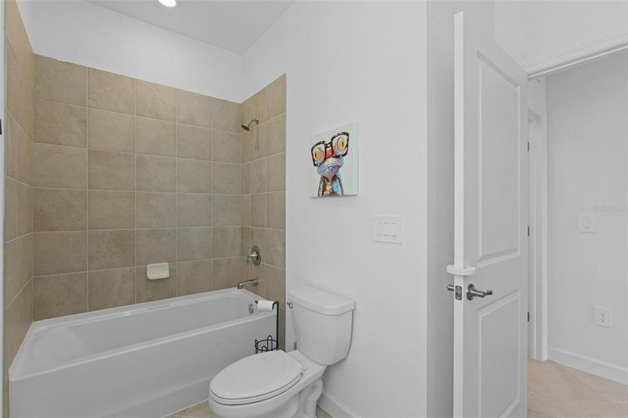 Furnished interior view inside a new home in Tuckers Cove: Villas, Punta Gorda (Image 34).