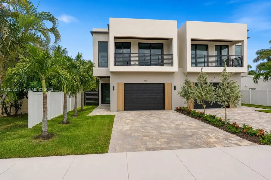 Front exterior of a new home in , Fort Lauderdale, FL, highlighting curb appeal (Image 1). Front exterior of a new home in , Fort Lauderdale, FL, highlighting curb appeal (Image 1).