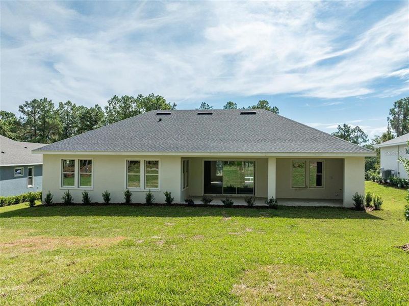 Exterior details and patio area of a home in Southern Hills Plantation, Brooksville (Image 3).