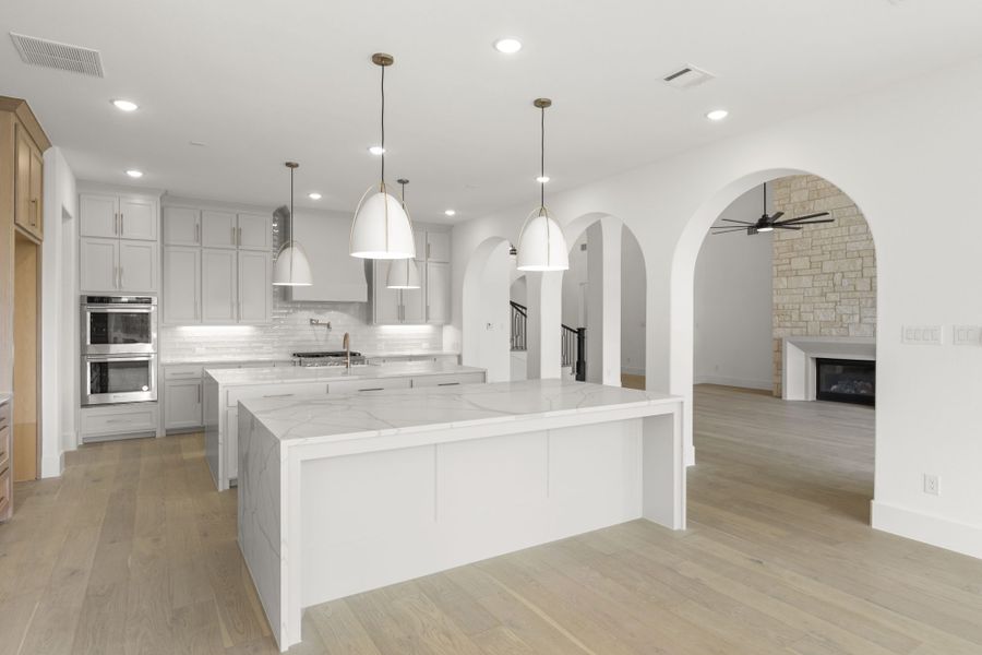 Representative furnished interior of a home built from the 7061 by Tradition Homes in Mustang Lakes, McKinney (Image 5).