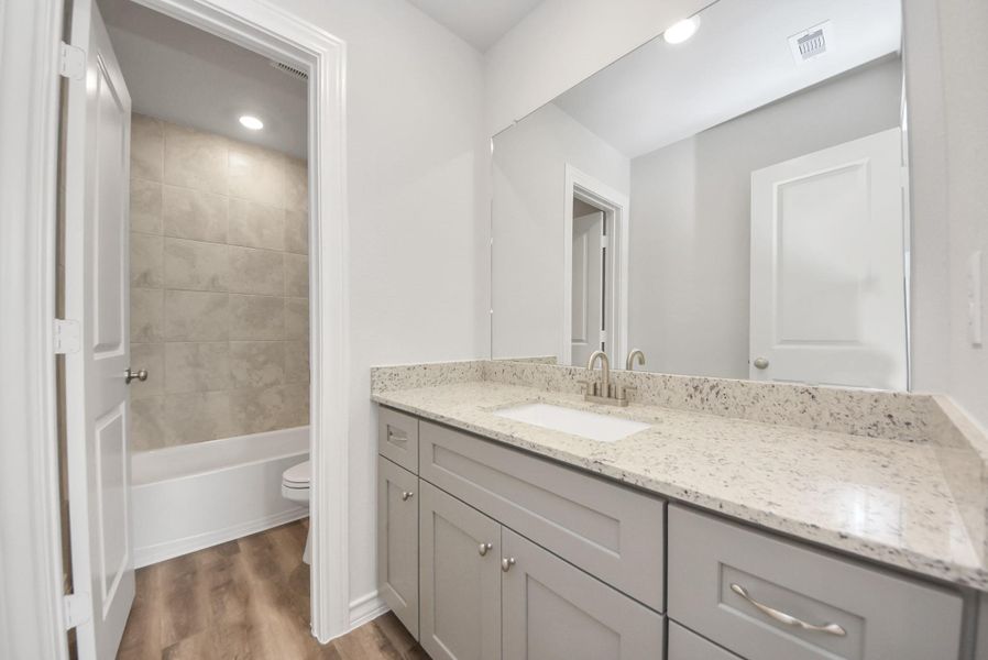 Furnished interior view inside a new home in The Enclave at Spring Branch, Conroe (Image 15).