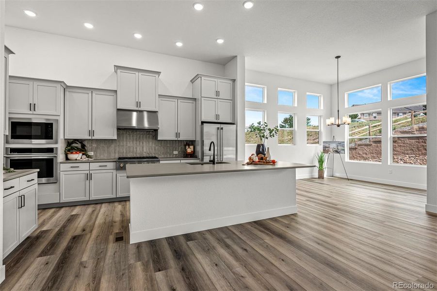 Furnished interior view inside a new home in Cloverleaf - Pinnacle Collection, Monument (Image 14).