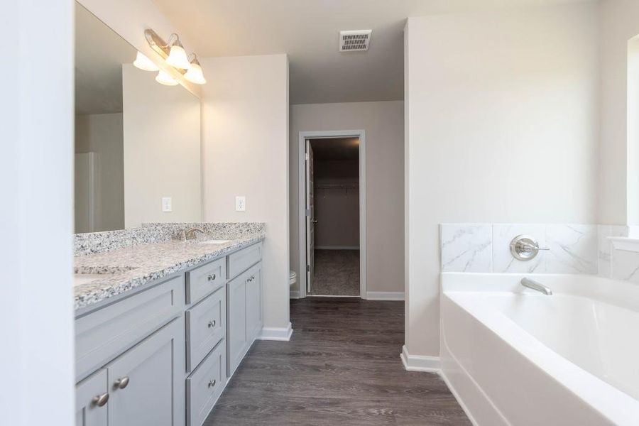 Furnished interior view inside a new home in Sutton's Landing, Statham (Image 8).
