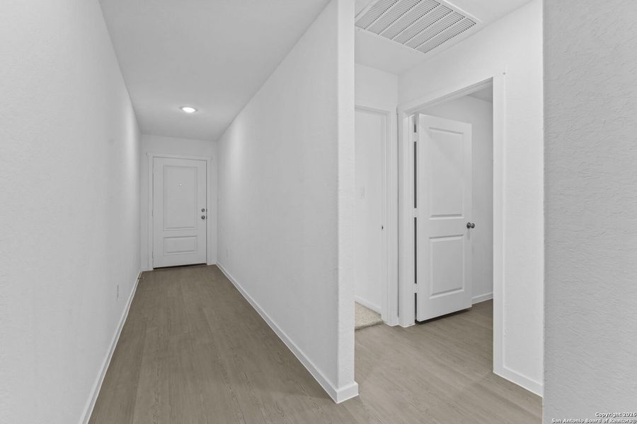 Spacious, unfurnished interior of a new home in Voss Farms: Watermill Collection, New Braunfels (Image 20).