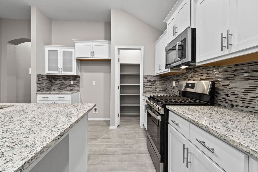 Representative furnished interior of a home built from the Acoma 1652 SSC by Saratoga Homes in Crossland, El Paso (Image 7).