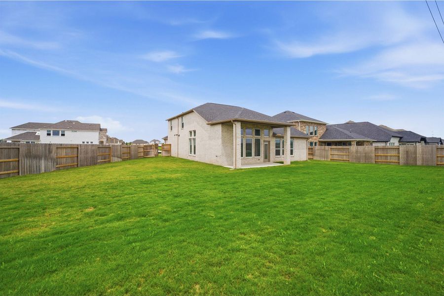 Exterior details and patio area of a home in Creekhaven, Arcola (Image 3).
