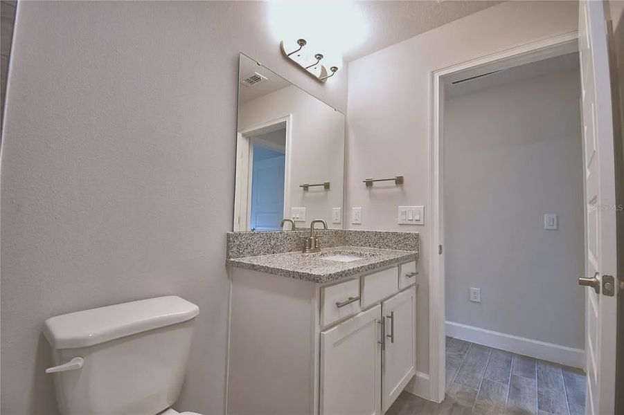 Furnished interior view inside a new home in Lake Juliana Estates, Auburndale (Image 13).