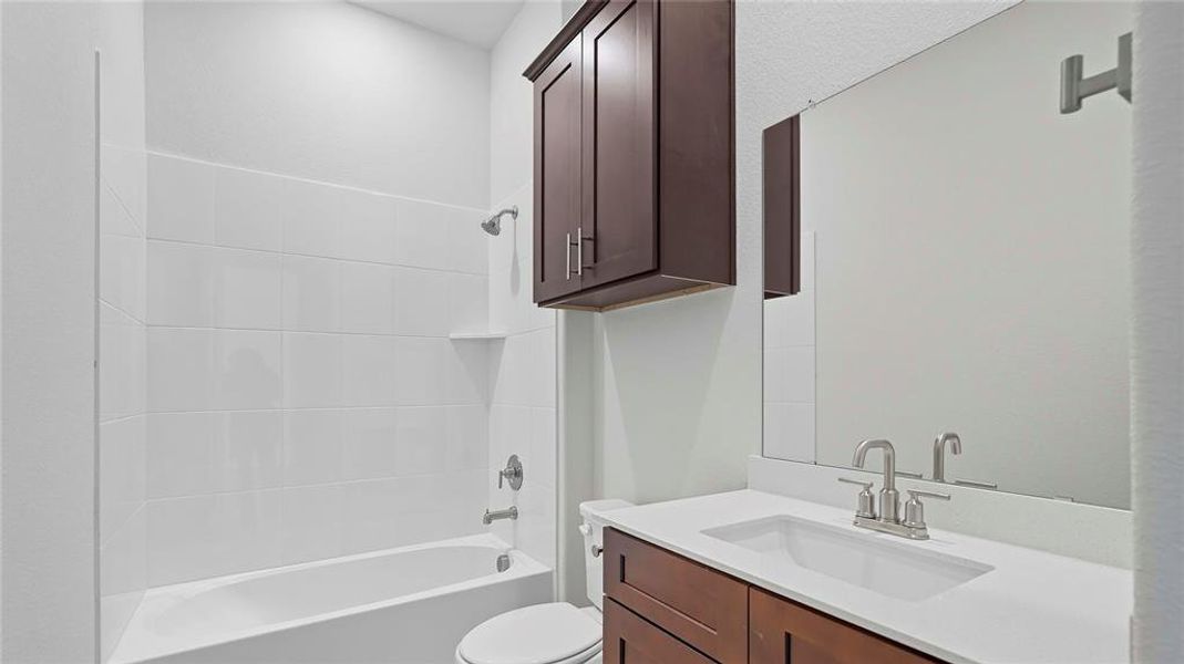 Full bath featuring vanity and shower / bathtub combination