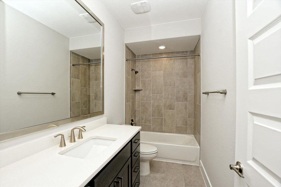 Furnished interior view inside a new home in The Hollows on Lake Travis, Leander (Image 14).