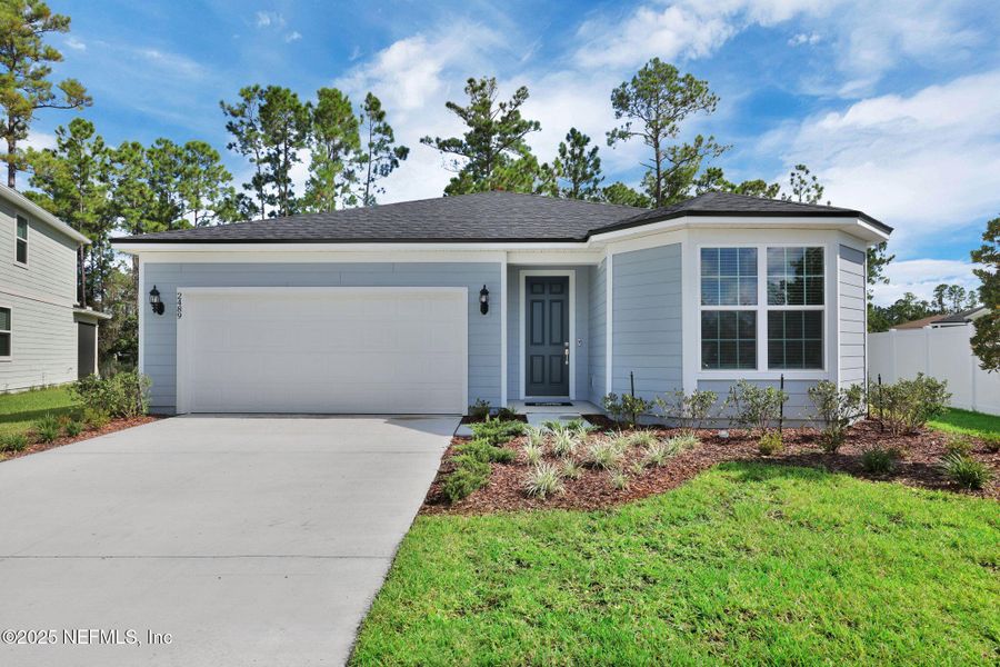 Front exterior of a new home in Bradley Creek, Green Cove Springs, FL, highlighting curb appeal (Image 22). Front exterior of a new home in Bradley Creek, Green Cove Springs, FL, highlighting curb appeal (Image 22).