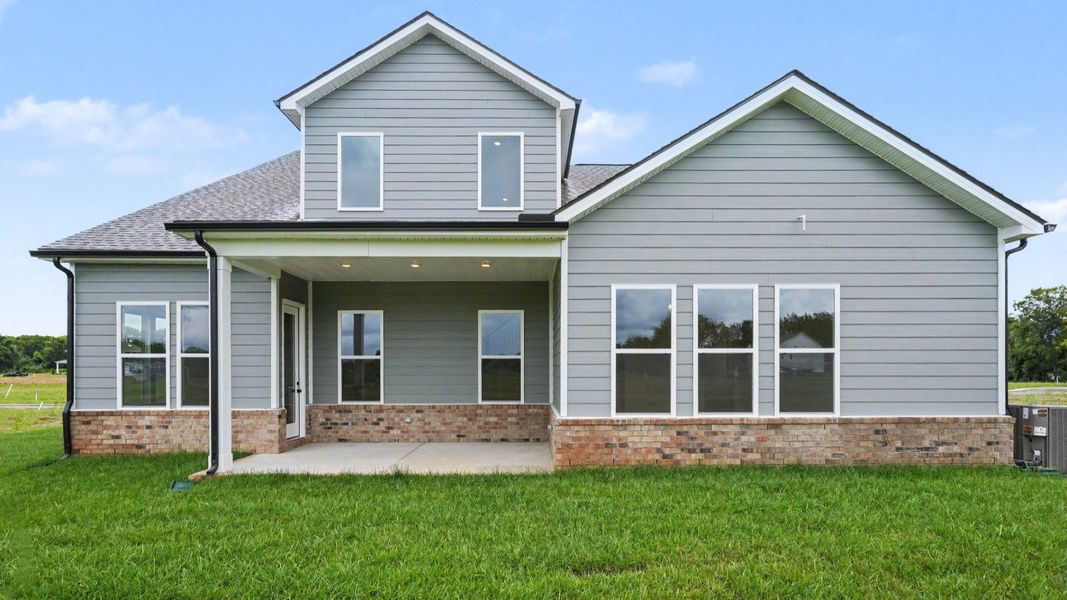 Rear exterior with view of covered patio