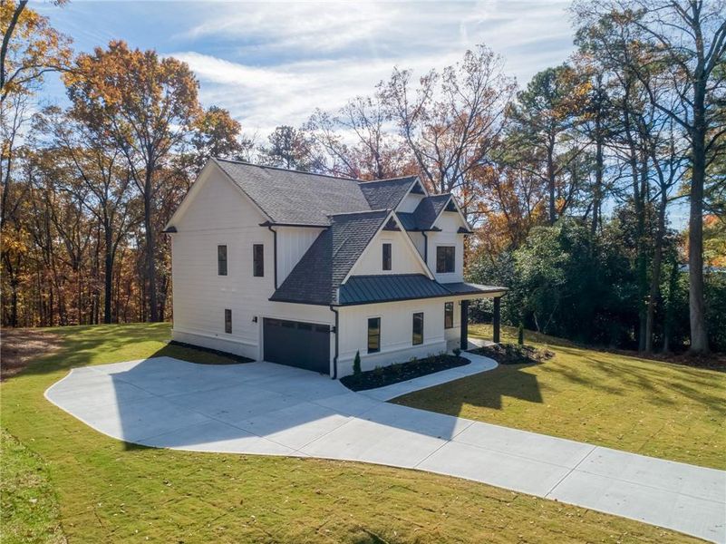 Front exterior of a new home in , Marietta, GA, highlighting curb appeal (Image 29). Front exterior of a new home in , Marietta, GA, highlighting curb appeal (Image 29).