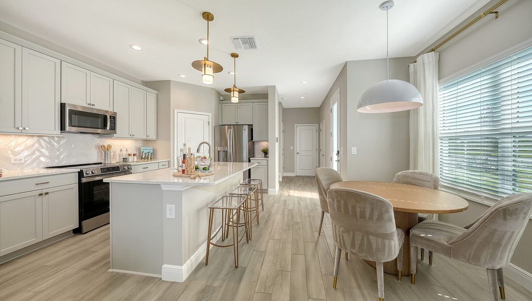 Representative furnished interior of a home built from the Parker by Neal Communities in SkySail, Naples (Image 10).