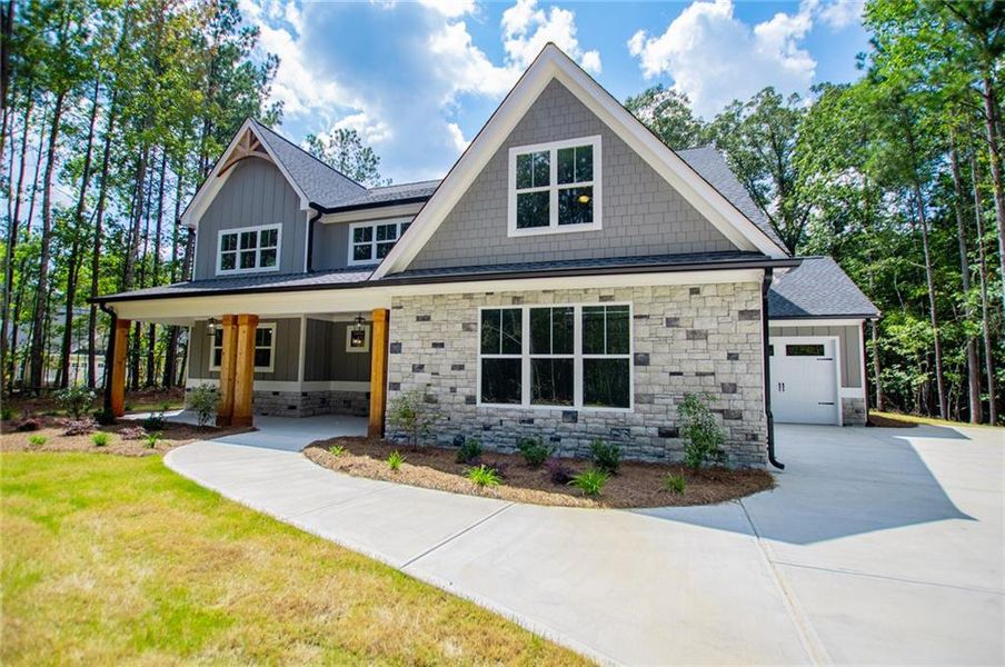Front exterior of a new home in , Douglasville, GA, highlighting curb appeal (Image 26).
