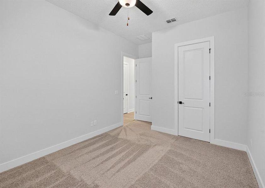 Spacious, unfurnished interior of a new home in Stables at Cary Forest, Bryceville (Image 31).