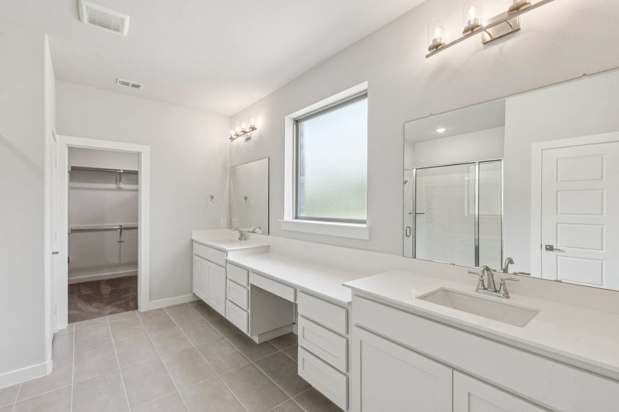 Primary Bathroom in the Mercury home plan by Trophy Signature Homes – REPRESENTATIVE PHOTO Primary Bathroom in the Mercury home plan by Trophy Signature Homes – REPRESENTATIVE PHOTO