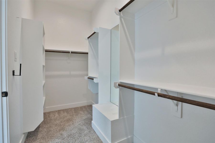 The primary bedroom also features a spacious walk-in closet, perfect for all your storage needs. The primary bedroom also features a spacious walk-in closet, perfect for all your storage needs.