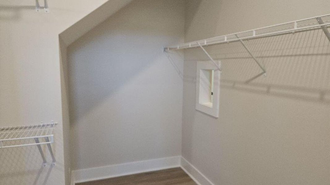 Spacious, unfurnished interior of a new home in The Enclave at French Quarter Creek, Huger (Image 21).