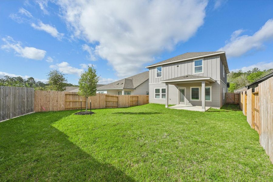 Exterior details and patio area of a home in Pine Lake Cove - Traditional Series, Montgomery (Image 3).