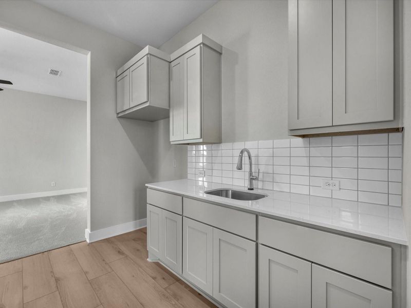 Furnished interior view inside a new home in Harvest Green, Richmond (Image 4).